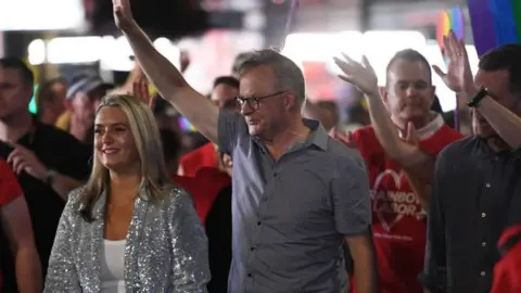 EPA Australia's Prime Minister Anthony Albanese (C) reacts as he attends the 45th annual Gay and Lesbian Mardi Gras parade on Oxford Street in Sydney, Australia, 25 February 2023.