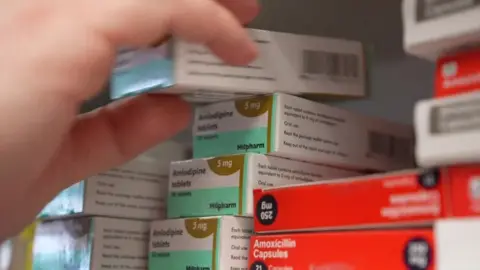 Drugs on a shelf in a pharmacy