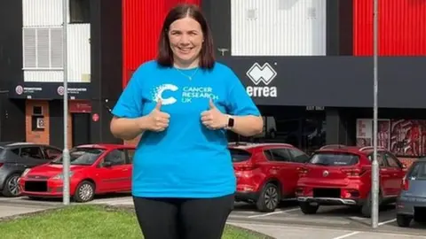 Jo outside Sheffield United