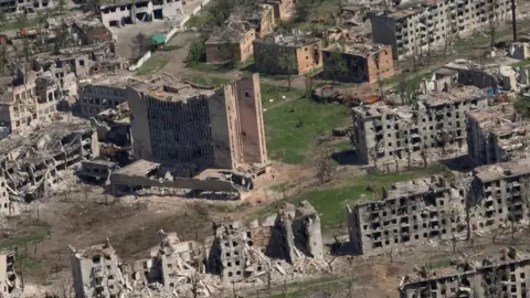 Reuters An aerial view shows destroyed buildings in Bakhmut, taken on 15 June