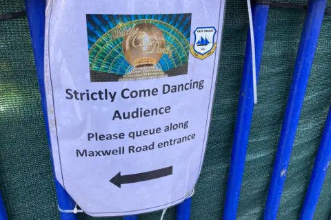 Katy Lewis/BBC Sign for queue for BBC Strictly Come Dancing