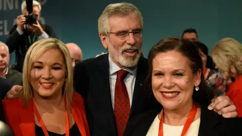 Reuters Michelle O'Neill, Gerry Adams and Mary Lou McDonald