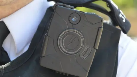 Met Police File image of an anonymous Met police officer wearing a body cam