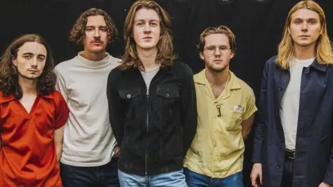 Getty Images Blossoms pose backstage at Leeds Festival in 2017