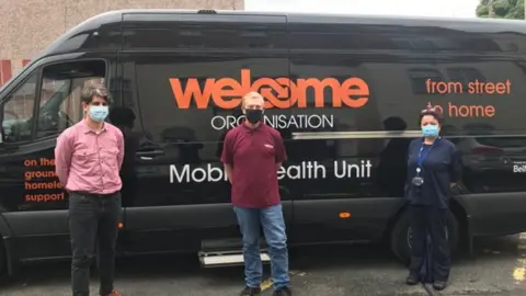 Western Health Trust Team at mobile health unit in North West