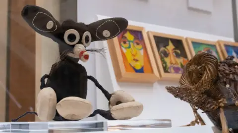 Chris James The Mouse, created by an unknown artist and salvaged from a hospital bin