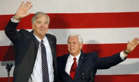 Getty Images Vice President Mike Pence joins Sen. Luther Strange (R-AL) at a campaign rally in Birmingham, Alabama on 25 September.