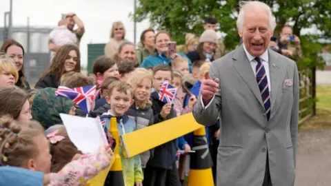 PA Media Well-wishers greet King as he visited the Army Aviation Centre in Hampshire