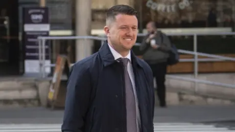 PA Media Tommy Robinson arrives at the Royal Courts of Justice, London