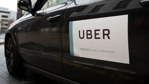 Getty Images Uber logo on the side of a car