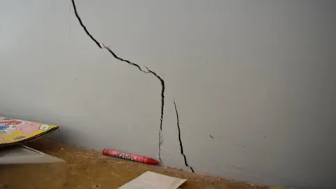 Residents have reported cracks in the walls and sewage coming up through their pipes