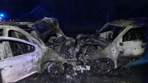 A141 March car crash leaves two cars in flames