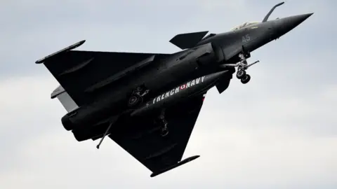 Getty Images Rafale fighter jet of the French Navy performs during the International seaplane show in Biscarrosse, southwestern France, on June 9, 2018