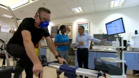 BBC A cyclist taking part in the trial