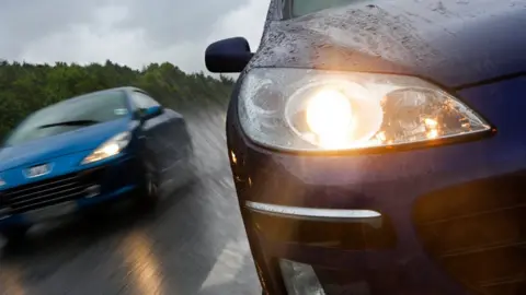 Getty Images Speeding cars