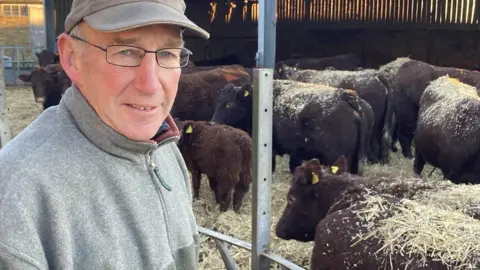 Phil Harrison/BBC Farmer Roger Dunn from Ash