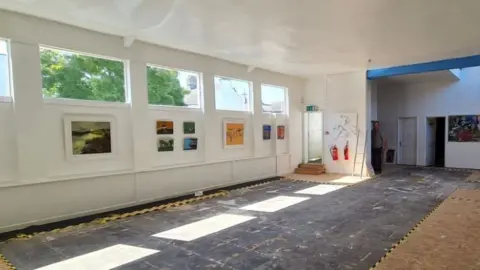 Miles Barry Artwork on walls at the pop-up gallery