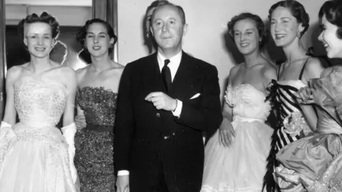 Getty Images Christian Dior with six models
