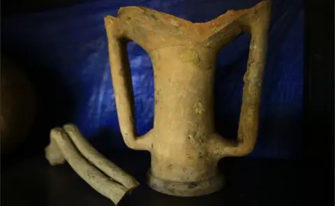 AFP This picture taken on April 24, 2018, shows artefacts found in King Khalmani"s burial chamber, in a Meroitic pyramid at the archaeological site of Bajarawiya, near Hillat ed Darqab, some 250 kilometres northeast of Khartoum. King Khalmani, whose burial chamber has been recently reopened to the public after years of darkness, ruled the Meroitic kingdom between 207 BC to 186 BC. The pyramid was previously opened in 1923 by the American archaeologist George Andrew Reisner.