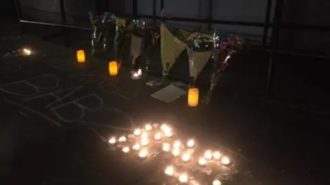 A vigil was held at a community centre on Thursday night