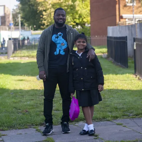 BBC Mickel Baptiste with daughter Alyssa