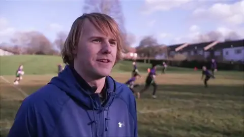 JAMES BURRIDGE/BBC Thomas Davies, coach