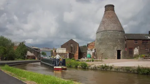 Getty Images Stoke on Trent, with canal and bottle kiln. - stock photo