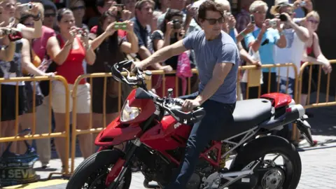 Getty Images Tom Cruise on a motorbike