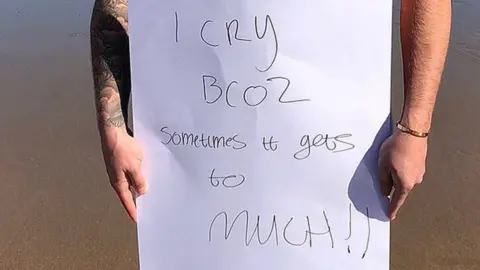 @tommy_mallett Tommy Mallet's sign