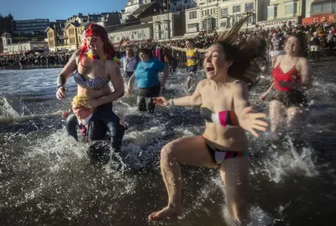 Danny Lawson/PA New Year's Day dippers at Scarborough