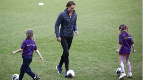 Reuters The Duchess played football with children at Windsor Park