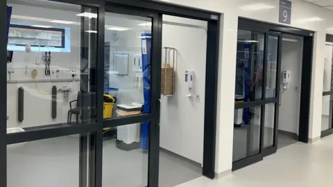 The new ED facility includes sliding doors, offering patients more privacy