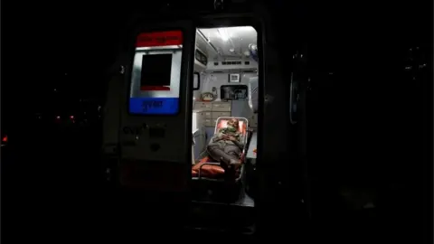 Reuters A patient lies inside an ambulance waiting in a queue to enter a COVID-19 hospital, amidst the spread of the coronavirus disease (COVID-19) in Ahmedabad, India, April 14, 2021
