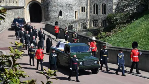 PA Media The Land Rover carrying the coffin of the Duke of Edinburgh in procession at Windsor Castle