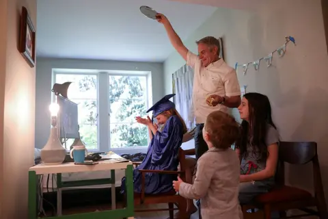 Caitlin Ochs / Reuters A graduation ceremony at home