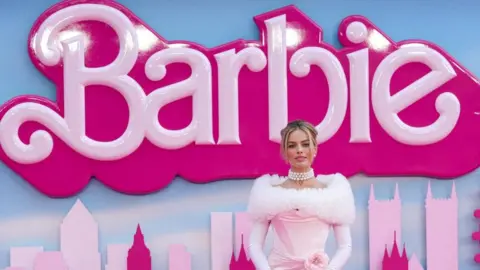 Margot Robbie as Barbie