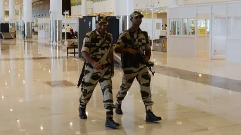 AFP Armed Central Industrial Security Force (CISF) patrol at a new international arrival terminal, developed under an airport modernisation programme in Chennai on 28 September 2018