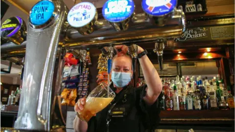 Getty Images A barwoman