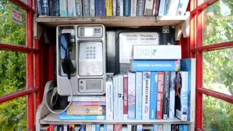 Getty Images Inside a phone box library