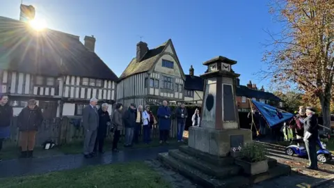Jane Armstrong The minute's silence is observed at a ceremony in the village of Headcorn, near Maidstone, Kent