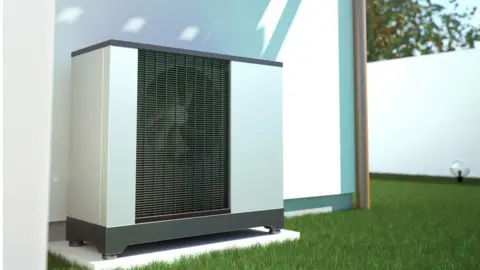 Getty Images 3d image of air source heat pump on the side of a house