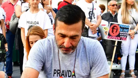 Getty Images Davor Dragicevic, whose son died in unexplained circumstances last March, at a protest in Banja Luka (file photo - July 2018)