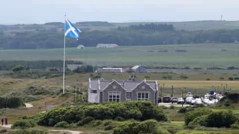 Andrew Milligan/PA Trump flagpole