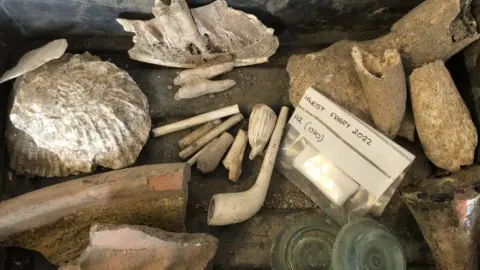 a mixture of objects found on the site