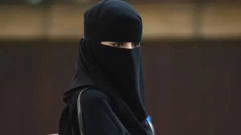 Getty Images Member of the Muslim community