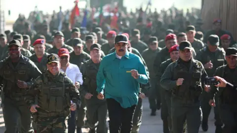 EPA Nicolas Maduro (c), exercises with soldiers at Fort Paramacay, in Carabobo, Venezuela, 27 January 2019