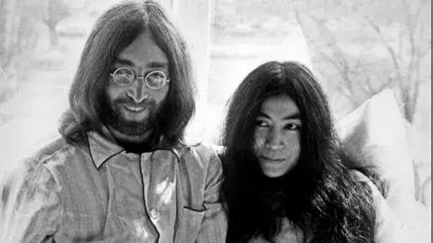 EPA File image taken 25 March 1969 shows late Beatles singer John Lennon and his wife, Yoko Ono, at the Hilton Hotel in Amsterdam