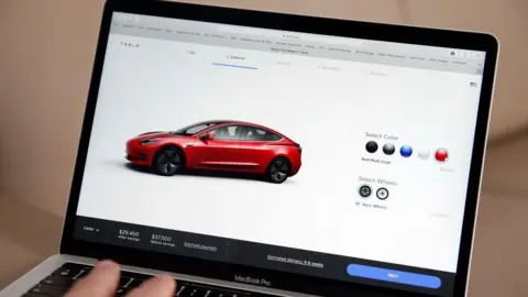 Getty Images Tesla website showing the Tesla 3 model