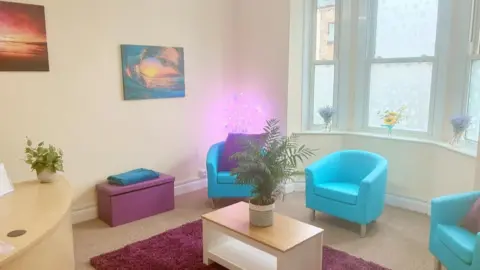 Peterborough Women's Aid A lounge with comfortable seating