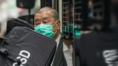 Getty Images Jimmy Lai, Apple Daily founder, arrives at the Court of Final Appeal ahead a bail hearing on February 9, 2021 in Hong Kong, China.